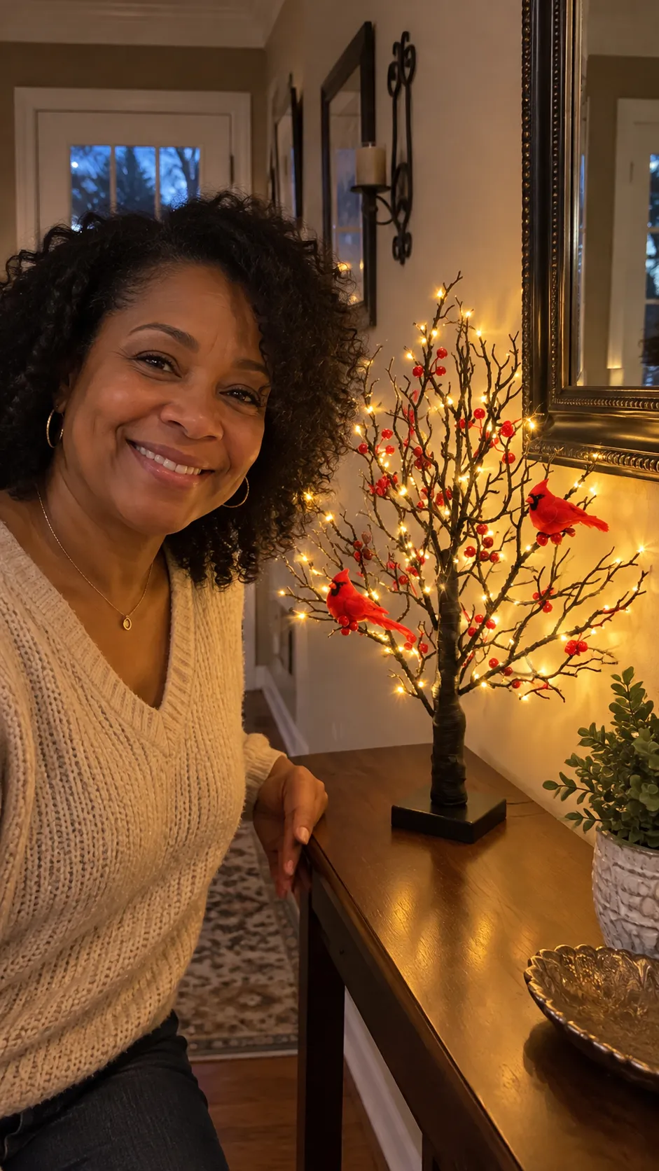 Cardinal tree light displayed on a wooden sideboard