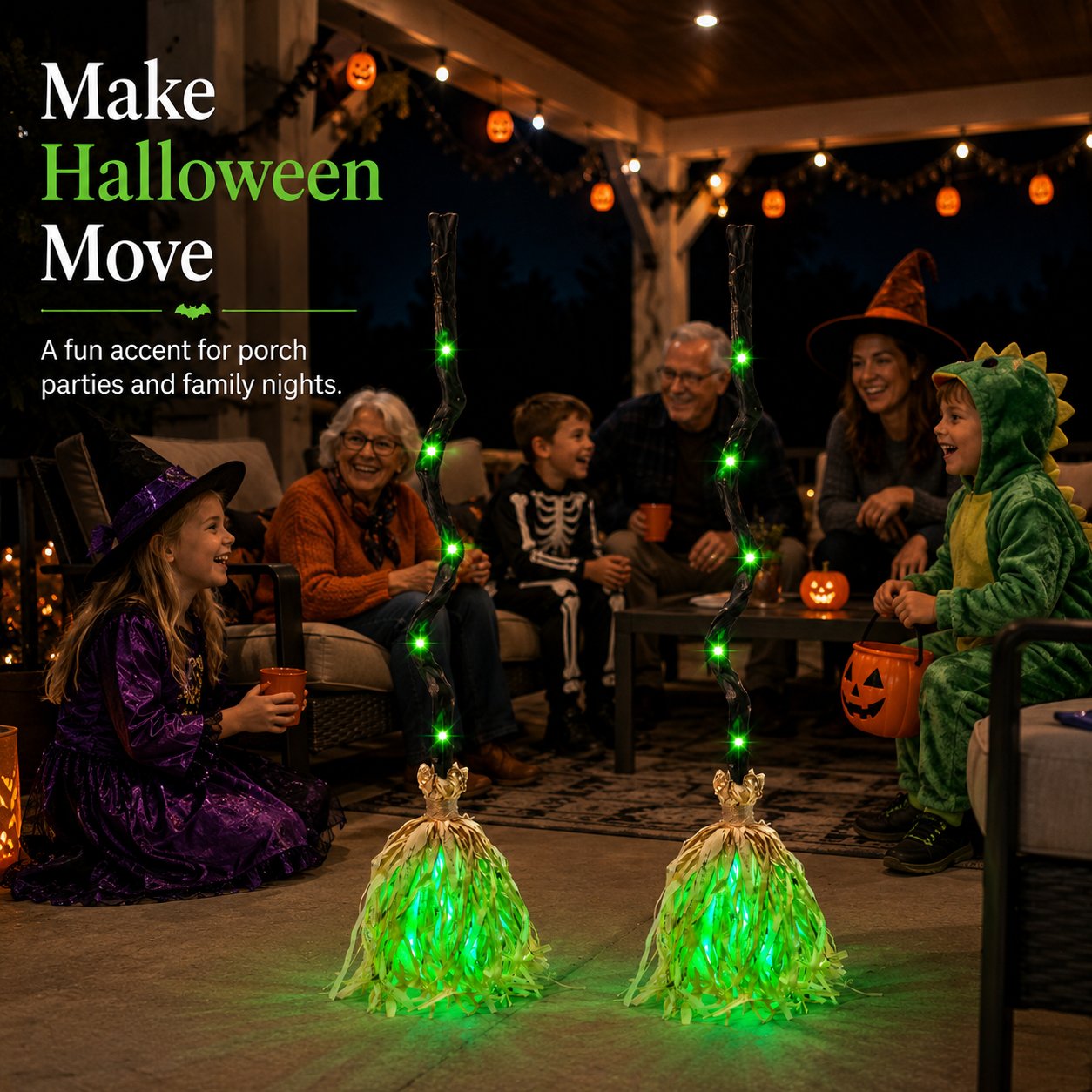 Two illuminated walking Halloween brooms at a family Halloween patio gathering Two illuminated walking Halloween brooms at a family Halloween patio gathering