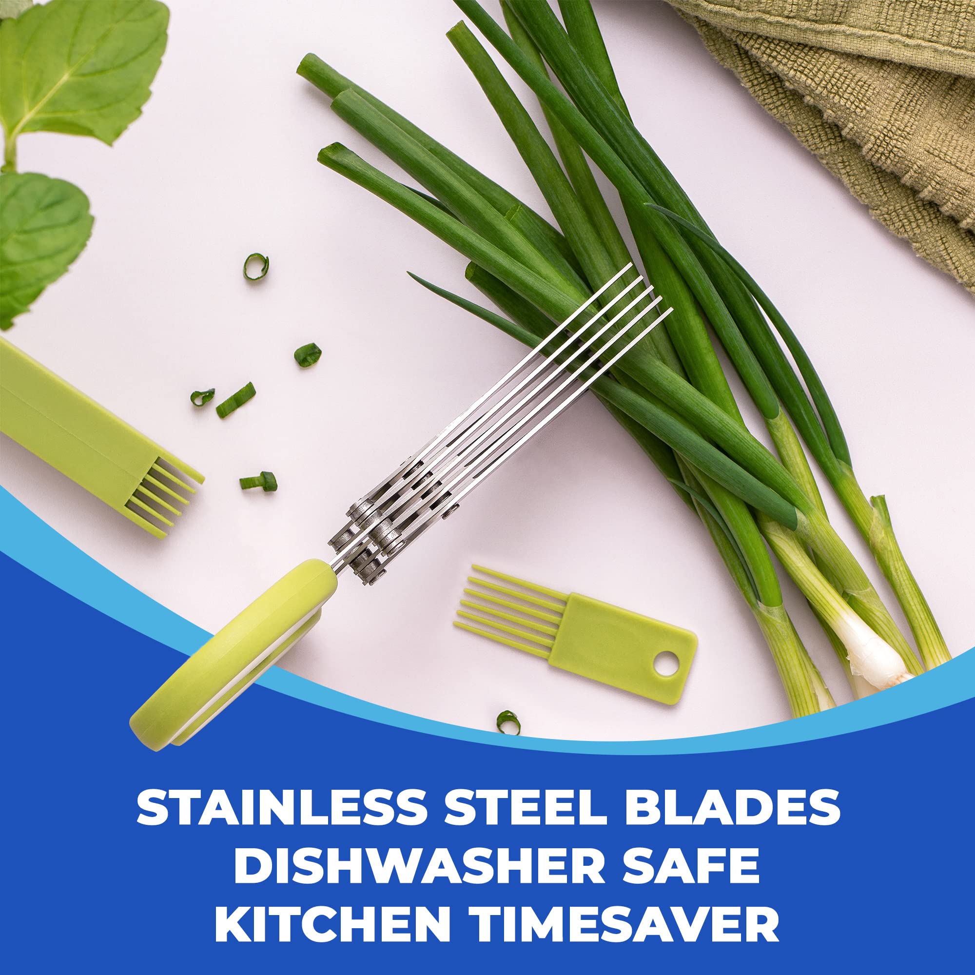 Stainless steel five-blade herb scissors cutting fresh green onions beside a cleaning comb
