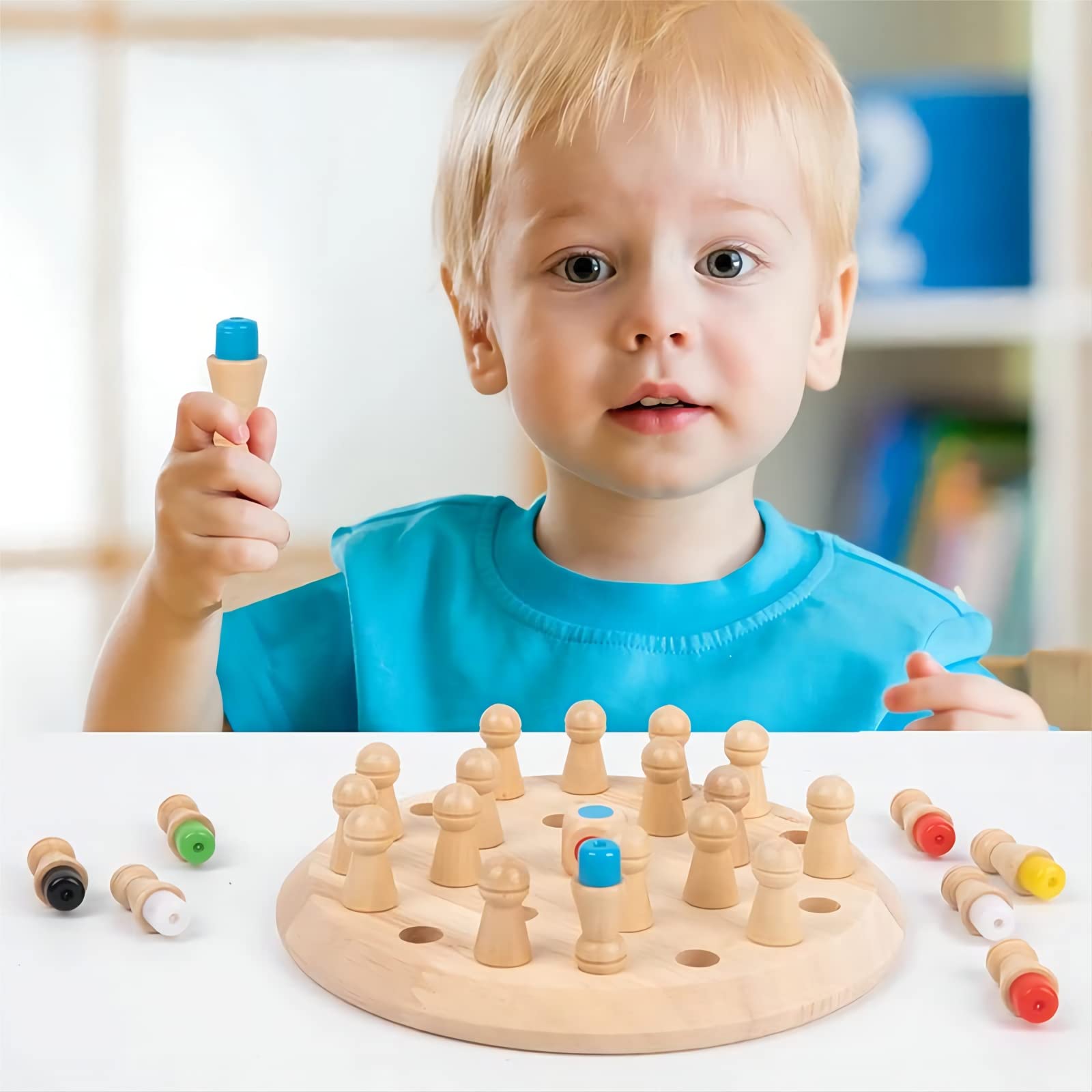 Toddler playing with chess piece