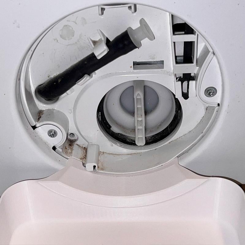 Front load washer lint filter open hatch view