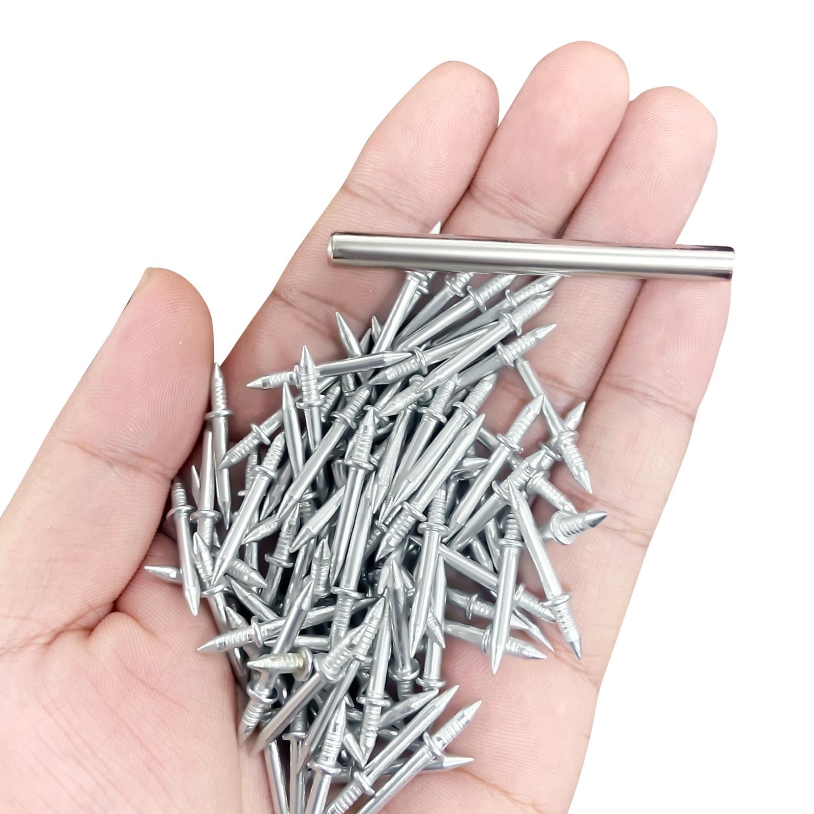 Double head seamless skirting nails and driver sleeve held in hand