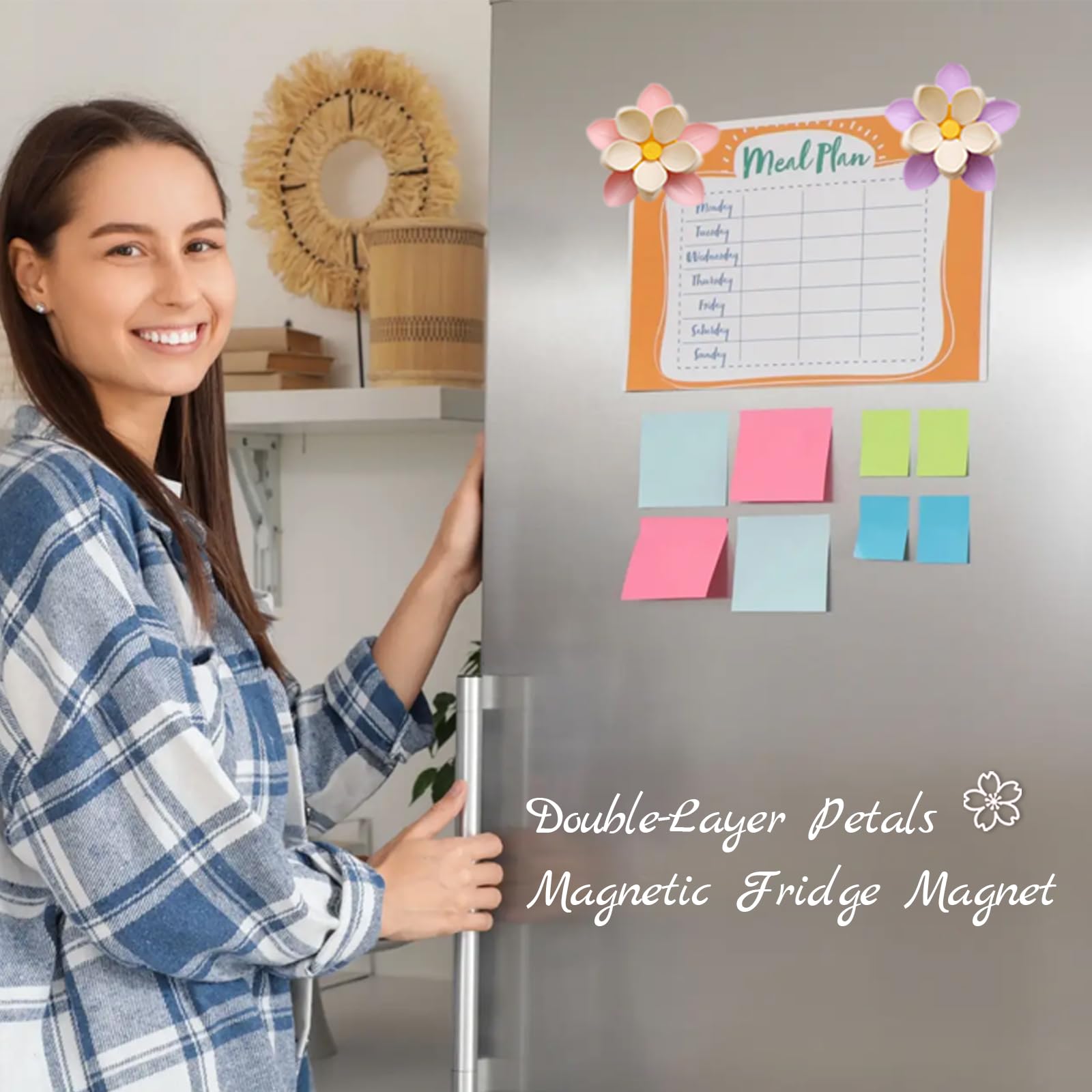 Woman using flower magnets for meal plans on fridge