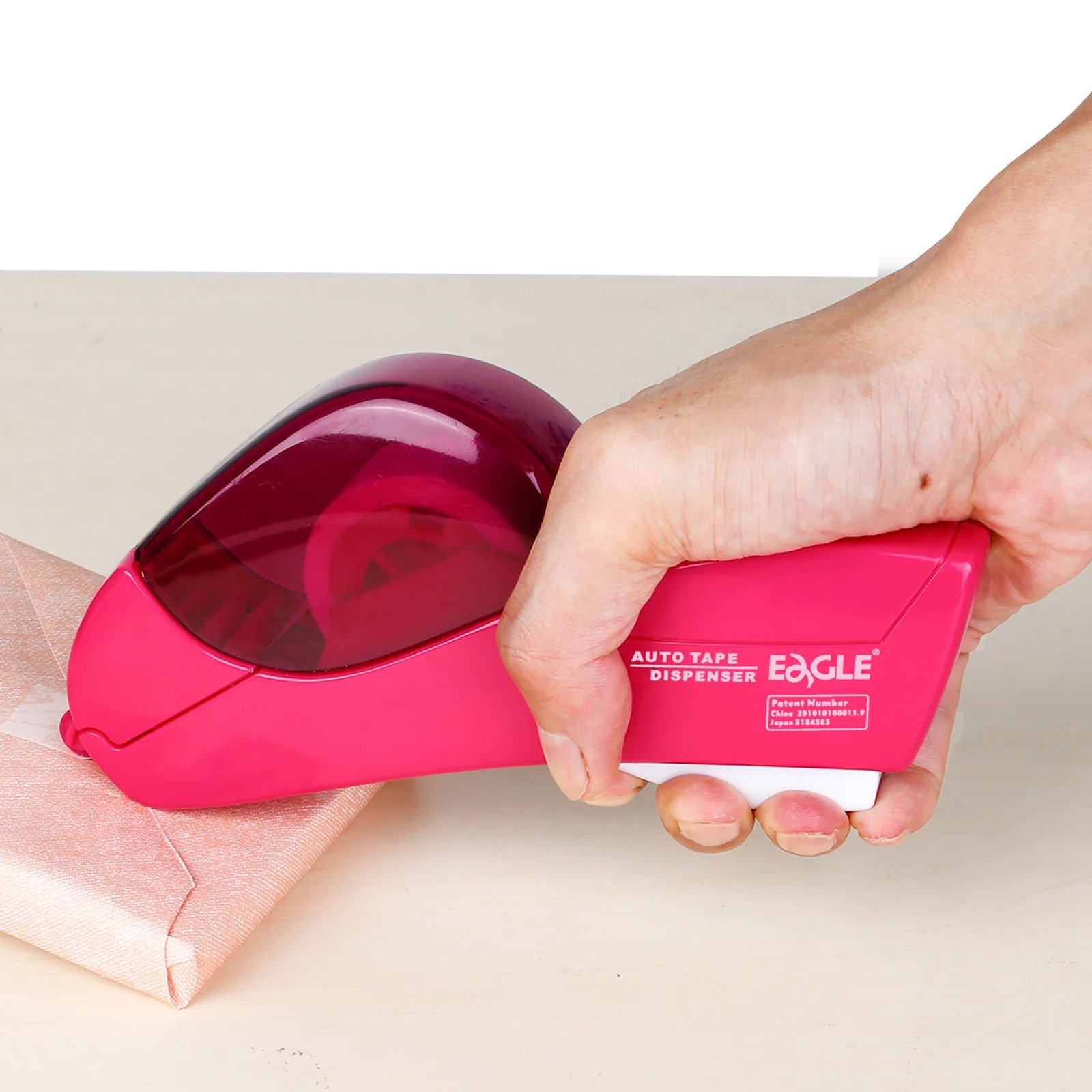 One handed tape dispensing tool
