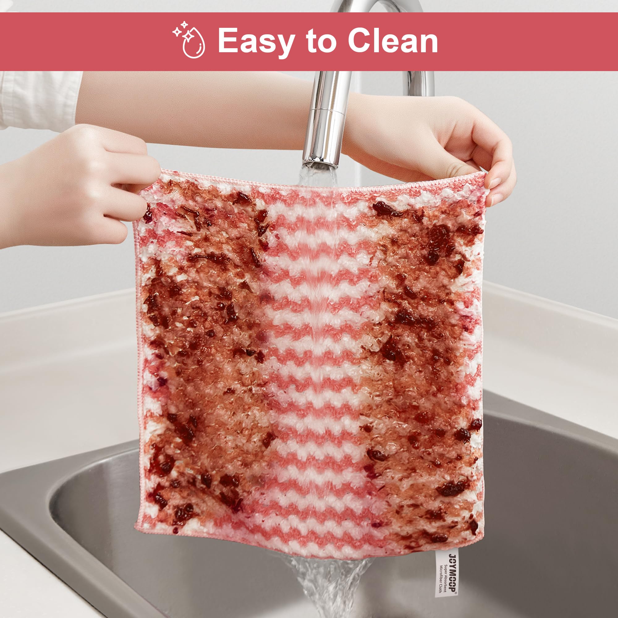 Rinsing heavy sauce off the dish cloth easily under running water tap