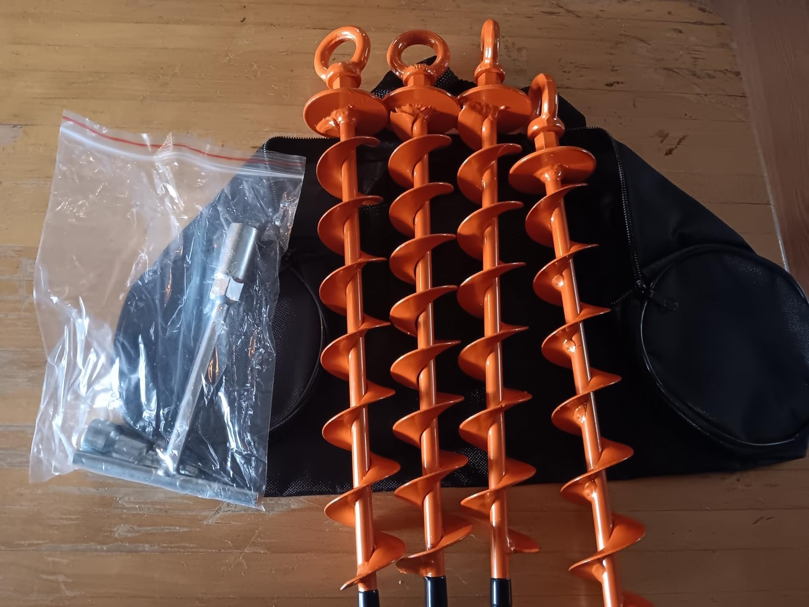 Customer review using spiral ground anchors