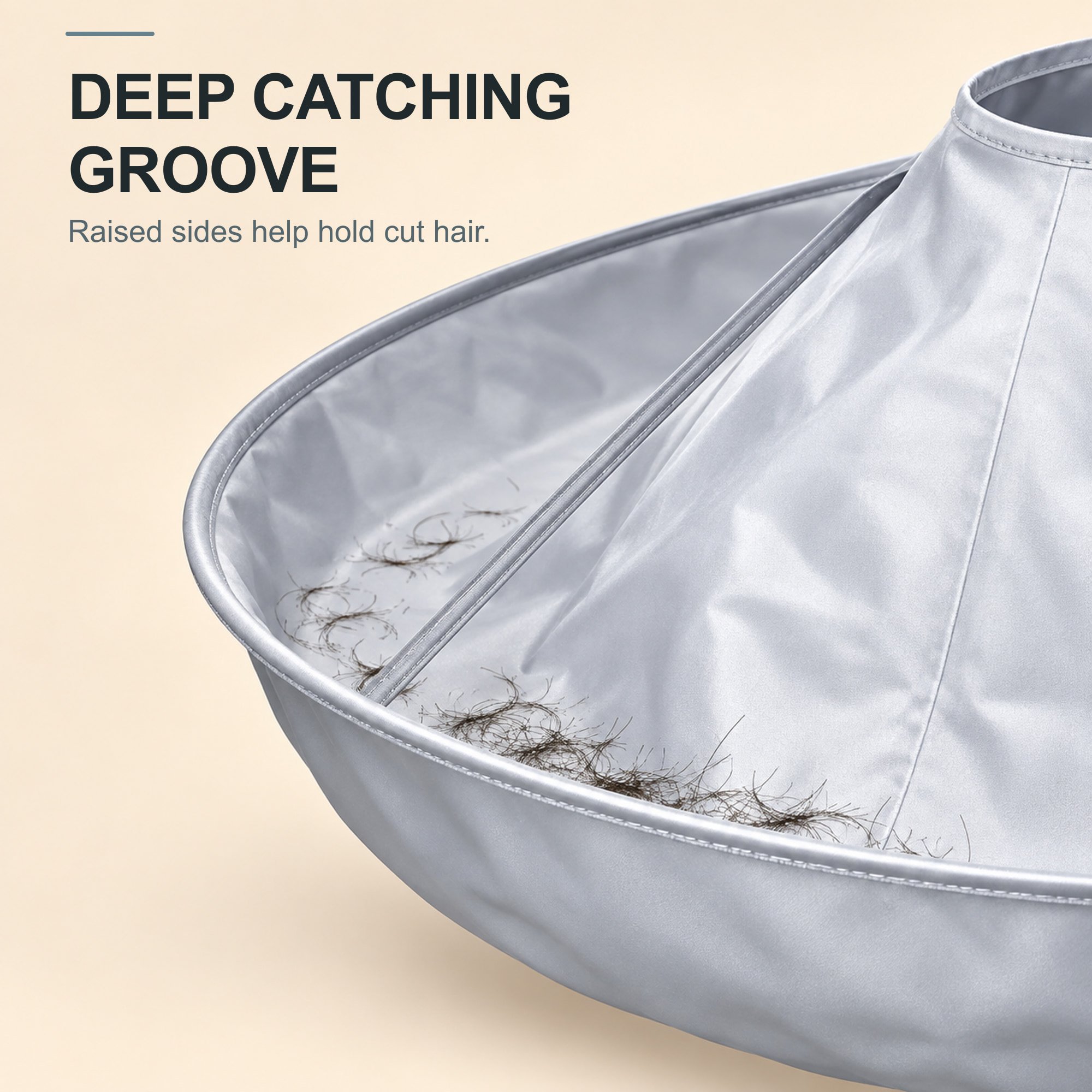 Deep raised groove on hair catcher cape holding cut hair clippings