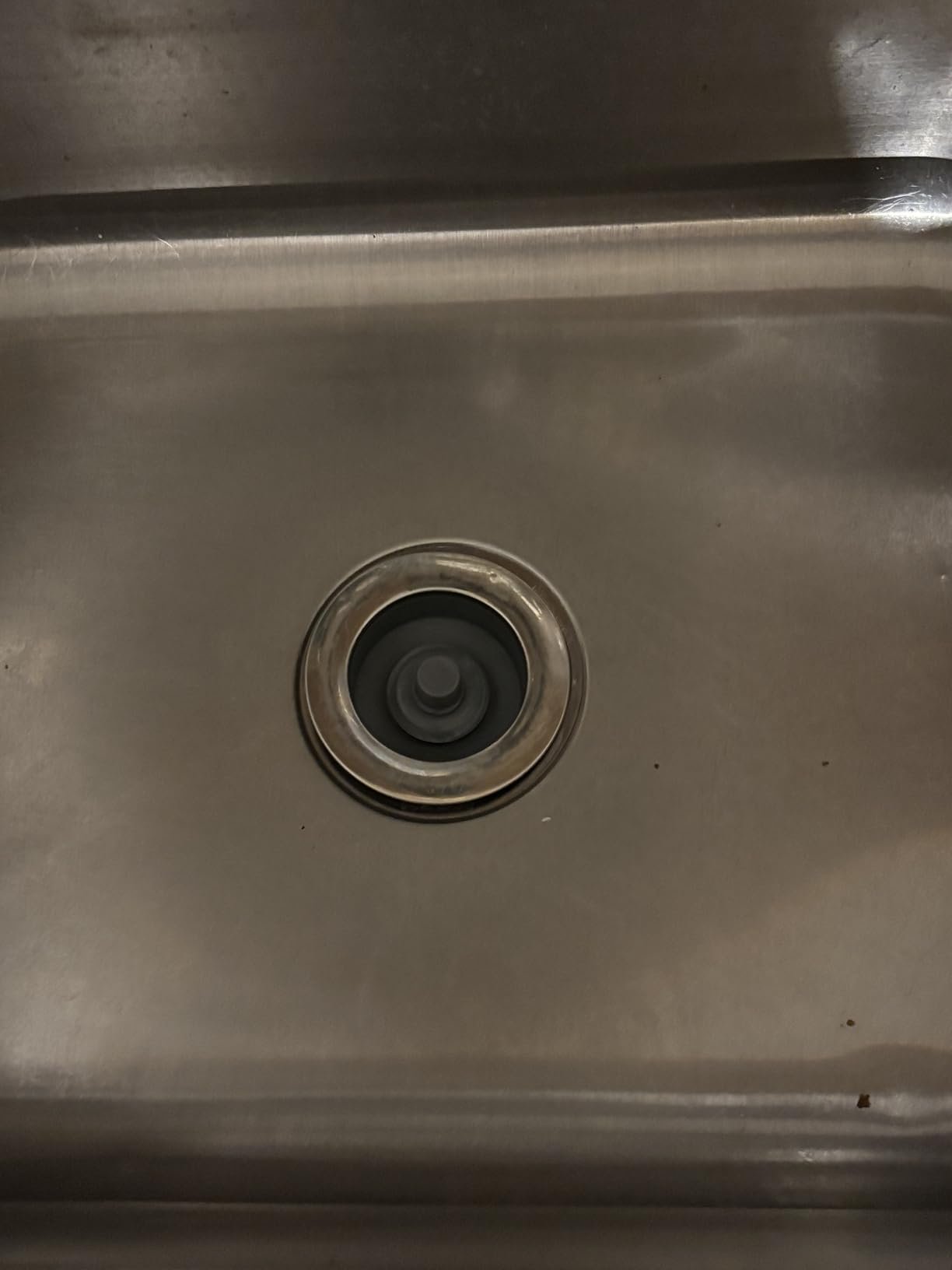 James P. stainless drain close-up