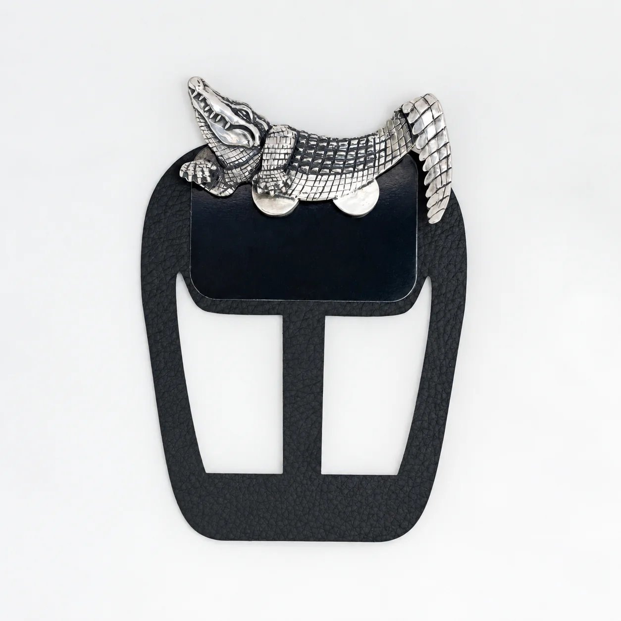 Alligator metal pocket square worn with a tailored suit