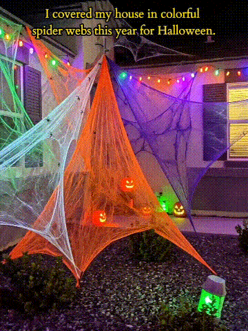 Stretching and decorating with Halloween spider web