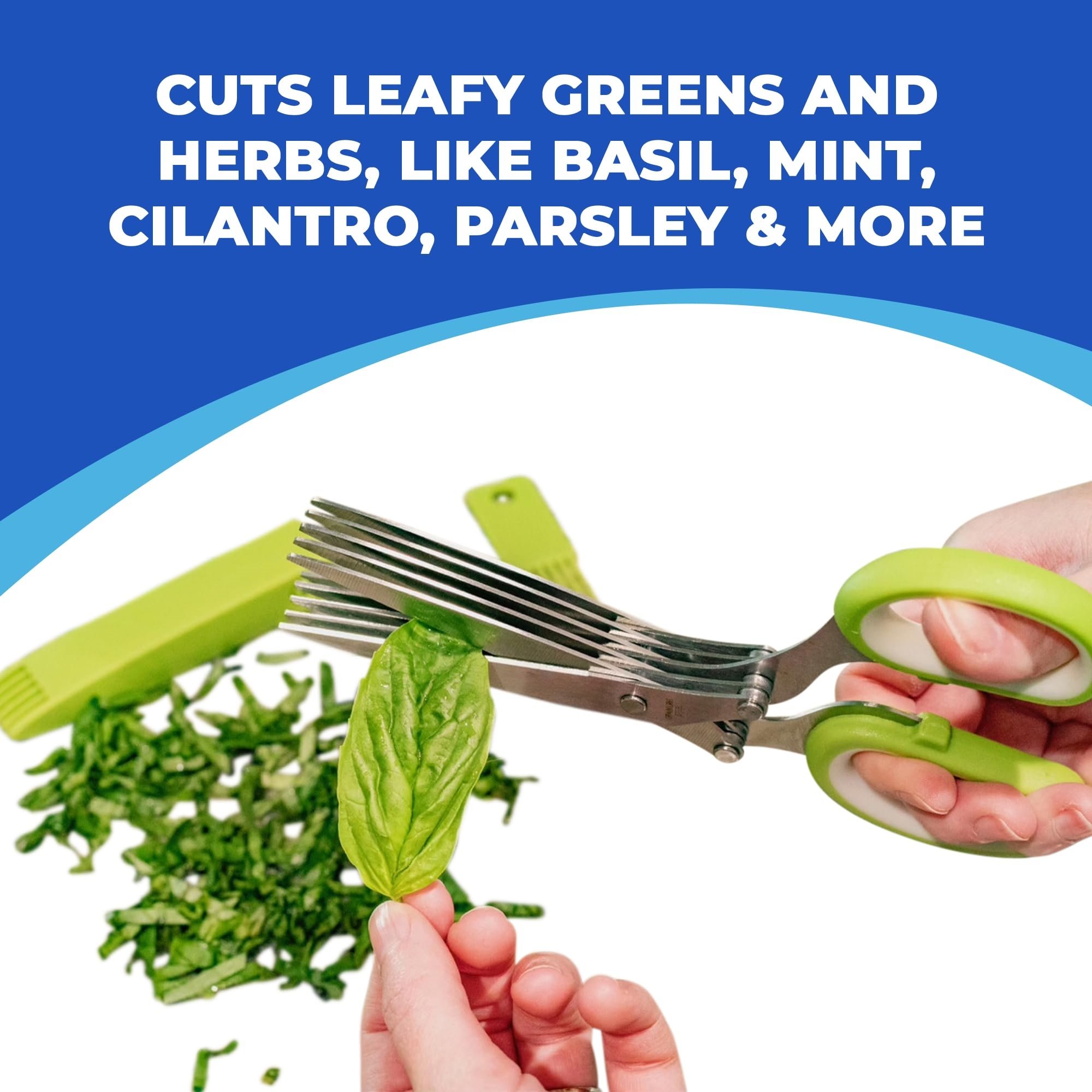 Five-blade herb scissors cutting a fresh basil leaf into even strips